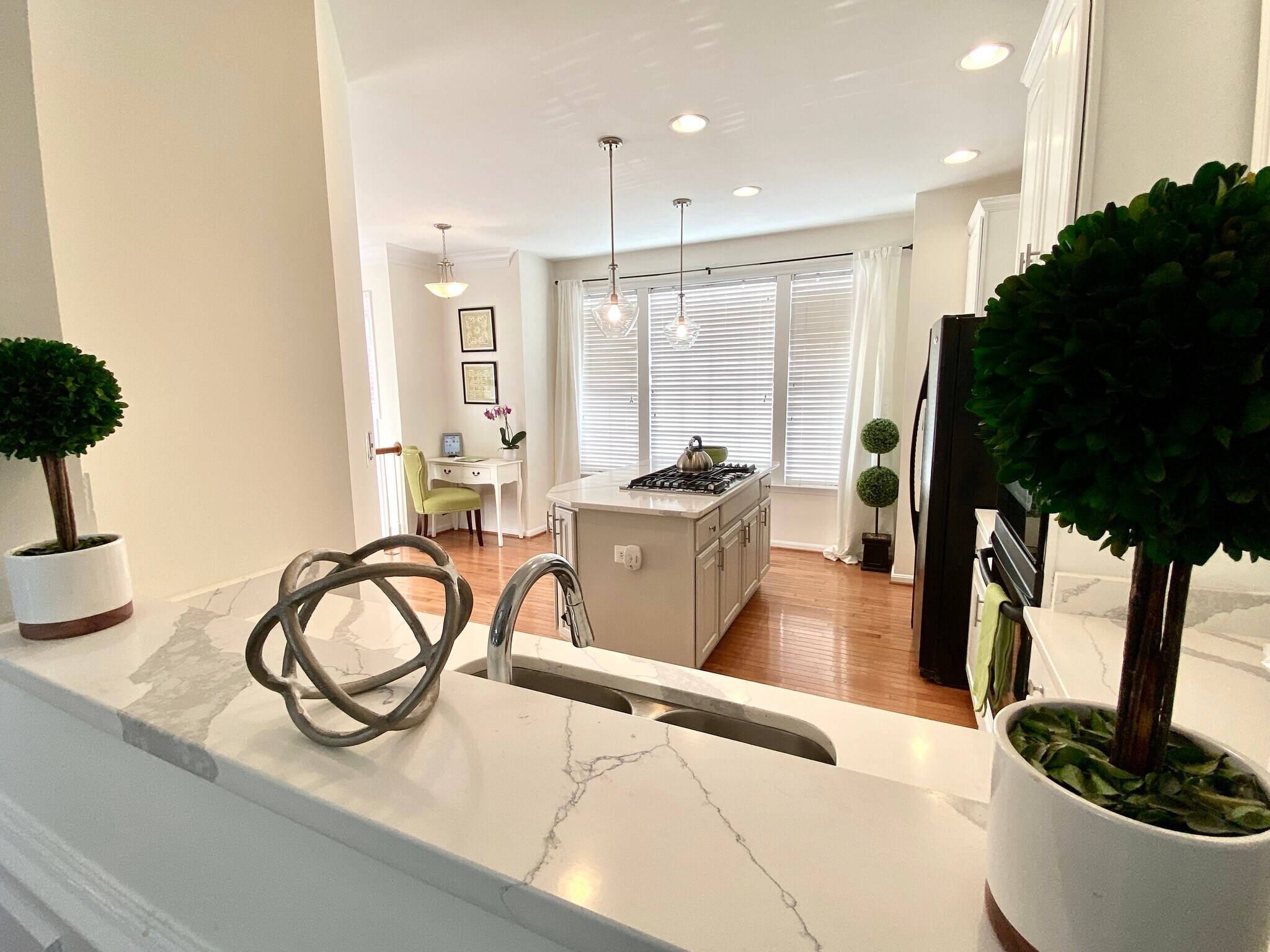 Kitchen Open to Dining Room - 810 Revelstore Ter NE