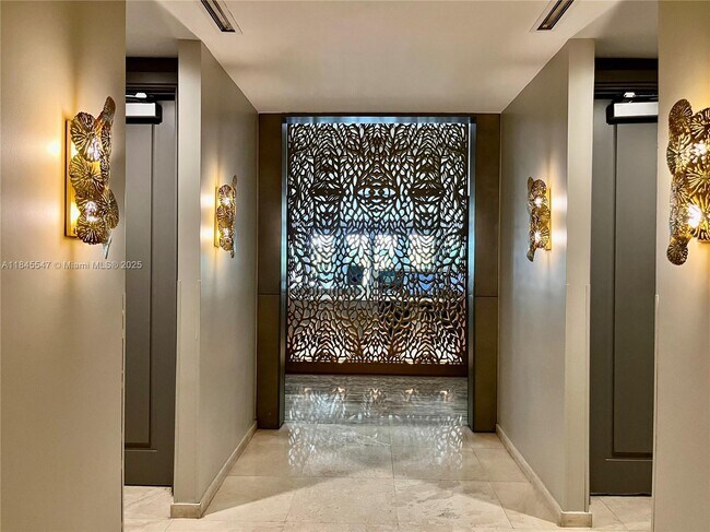 Building Photo - 10275 Collins Ave