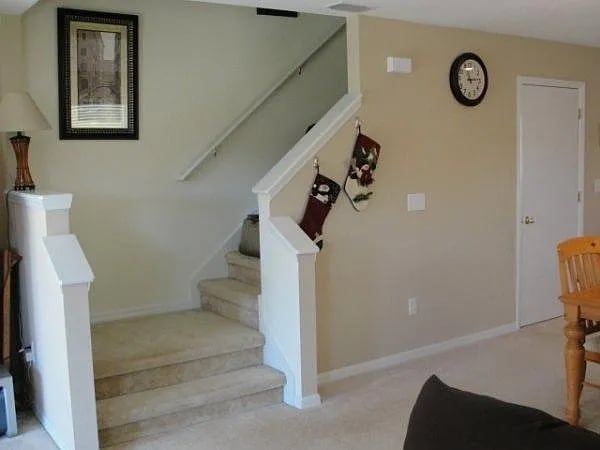 Living room looking at stairwell - 2537 Harn Blvd