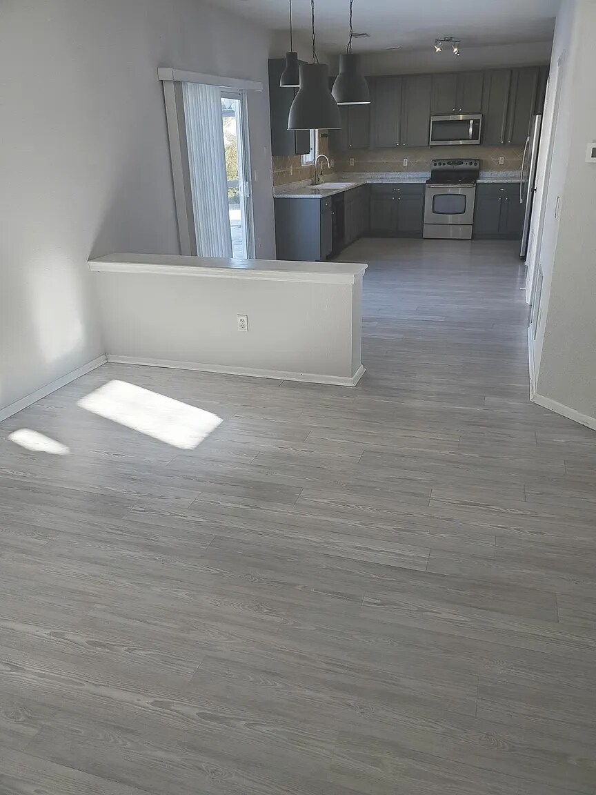 Family Room to Kitchen - 19443 E 59th Ave