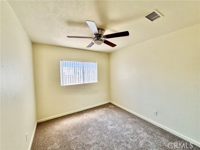 Building Photo - 7415 Cherimoya Ct