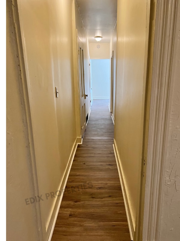 Hallway to Bedrooms and kitchen - 613 N main st