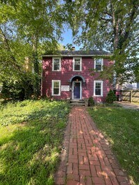 Building Photo - 3-Bedroom House with Theater-style Basement | Parking, Laundry, & Fenced Yard