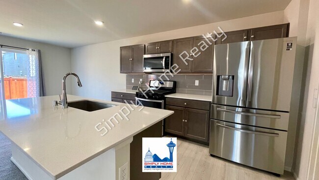 Building Photo - Spacious Tumwater home with a rare downstairs bedroom and a full bathroom!
