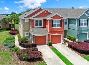 Building Photo - Corner Unit ~ Lake View ~ Maintenance Free...