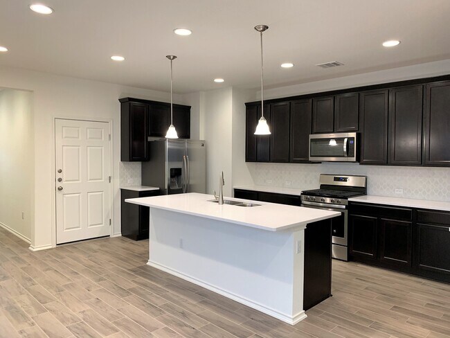 Building Photo - Home in The Village at Wells Branch