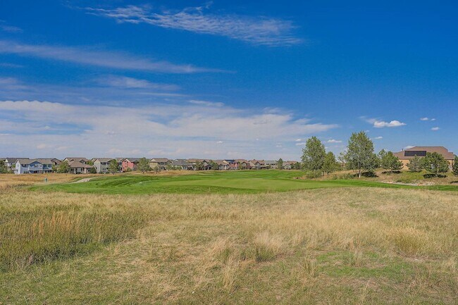 Building Photo - Beautifully maintained 5-bedroom home with a large finished basement, club access, and top-rated ...