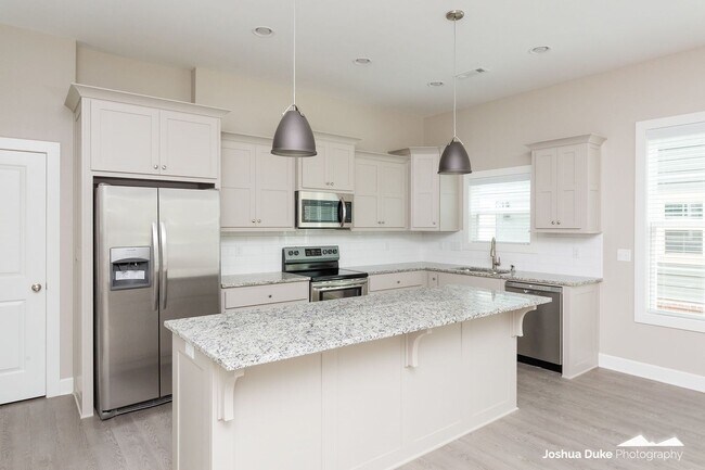 Building Photo - Now Pre-Leasing — Brand-New Luxury Townhom...