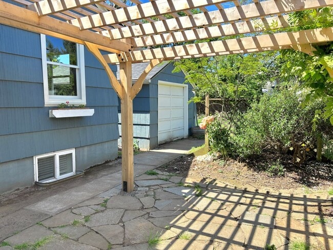 Building Photo - Spacious Montavilla Home on Corner Lot with Hardwoods, A/C, 1 Car Detached Garage, Finished Attic...