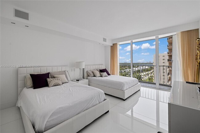 Building Photo - 10155 Collins Ave