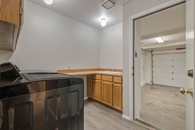 Building Photo - Spacious 5-Bedroom Home with Beautiful Bac...