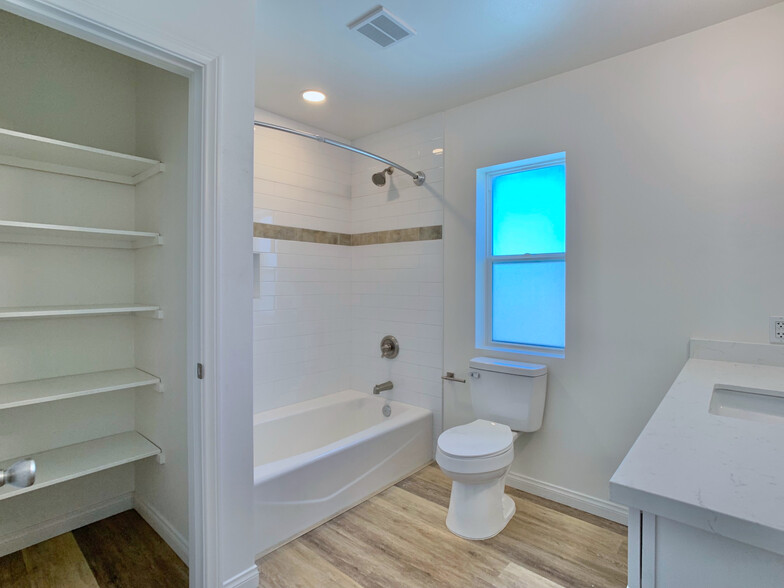 Large master bathroom with large linen closet - 1051 Greenfield Dr