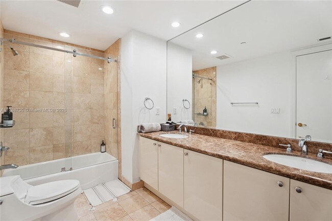 Building Photo - 10225 Collins Ave