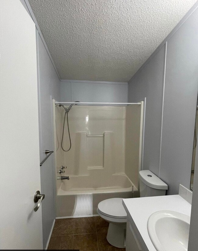 Building Photo - 8179 Sandwedge Terrace