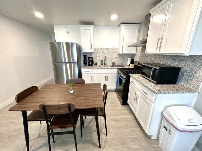 Full Kitchen with Dining Table - 5200 Carousel Dr