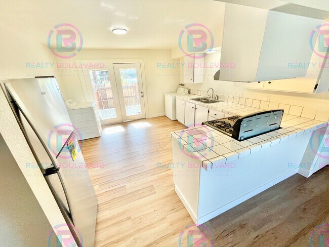 Building Photo - Charming 2-Bedroom 1 Bath Fenced Backyard with Patio