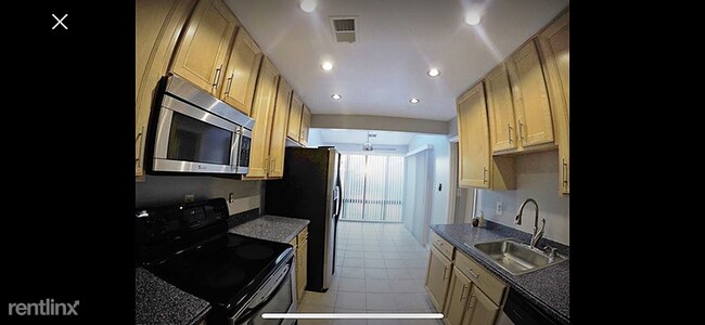 Building Photo - 3 br, 2 bath Condo - 8040 Needwood Road 204