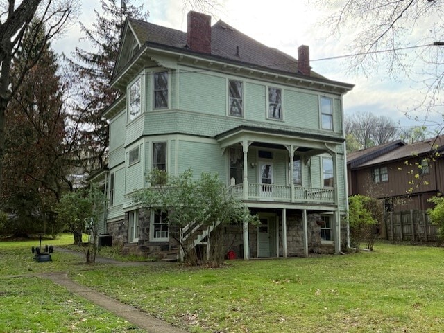 Rear of home with porch - 1380 National Rd