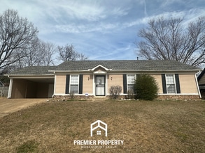 Building Photo - Quiet Cove Living in 38115 | 3BR/2BA with Brick Fireplace & Fenced Yard