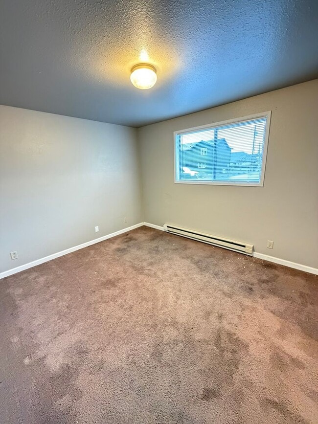 Building Photo - Update Two Bedroom on the First Floor with Covered back patio!