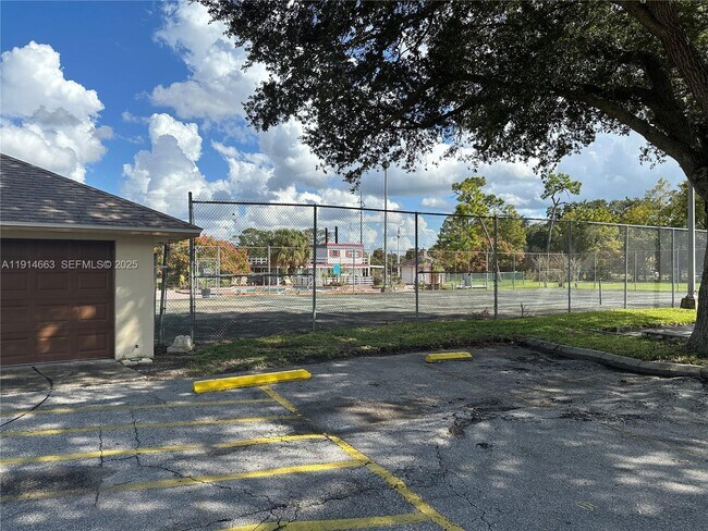 Building Photo - 6060 Village Cir N