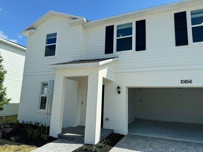 Building Photo - 10856 NW Everbreeze Dr
