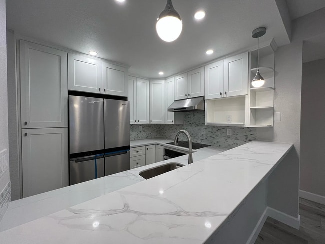 Building Photo - Completely renovated New hardwood floors.