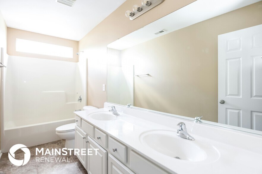 Building Photo - 6826 Championship Dr