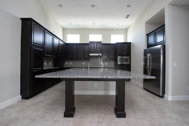 Building Photo - Modern 2 bedroom, 2 bath Townhouse with Bonus Room in the Laureate Park Community of Lake Nona.