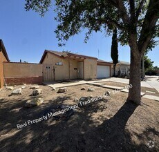 Building Photo - Cute 3 + 2 in Palmdale