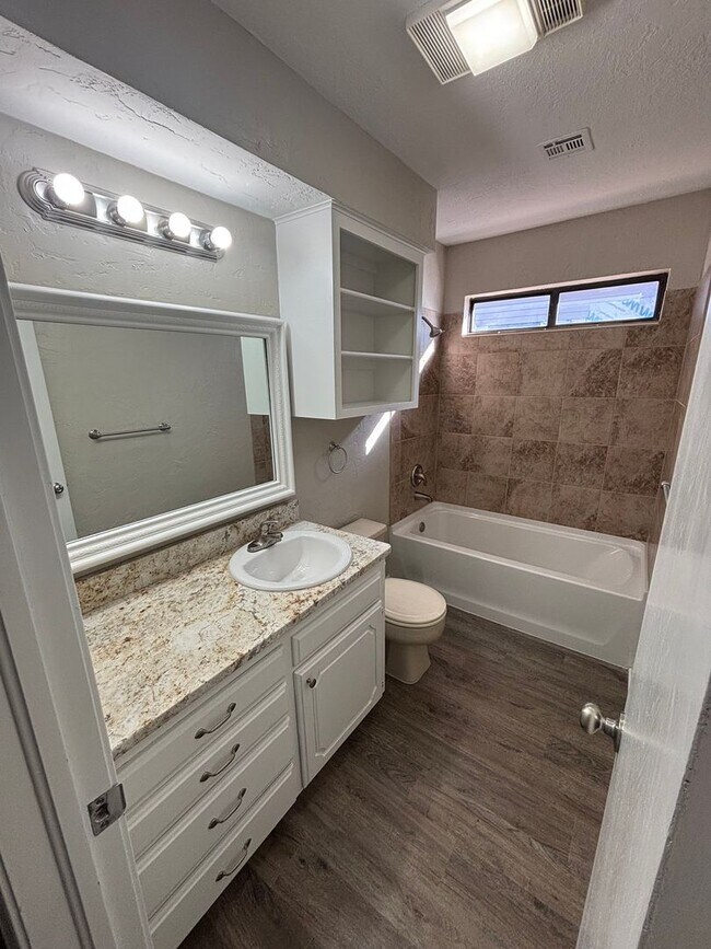 Building Photo - Beautifully remodeled with new paint, floo...