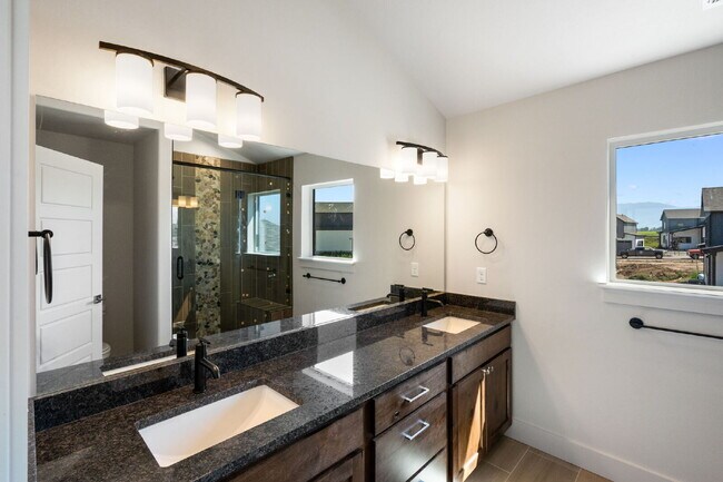 Building Photo - Lock-and-Leave Luxury Living — Lawn Care & Snow Removal Included!