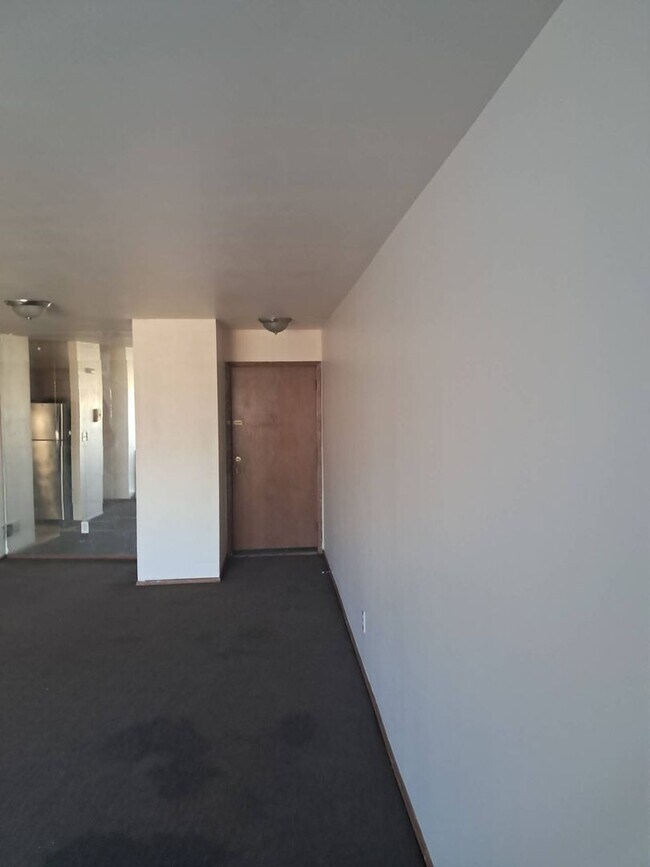 Building Photo - 6011 W Port Ave