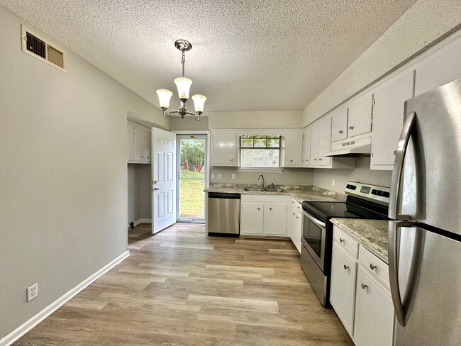 Building Photo - Spectacular Special - $1/2 OFF First Month's Rent & Stanley Travel Cup ($40.00 Value)