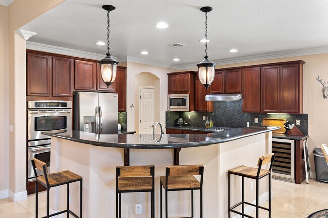 Building Photo - Spacious Mountain’s Edge Home with Den, Sunroom, 3-Car Garage & Private Spa Retreat