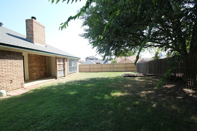 Building Photo - Corner Lot Charmer Off Chapel Creek | 4BR/2BA with Fireplace, Garden Tub & Fenced Backyard