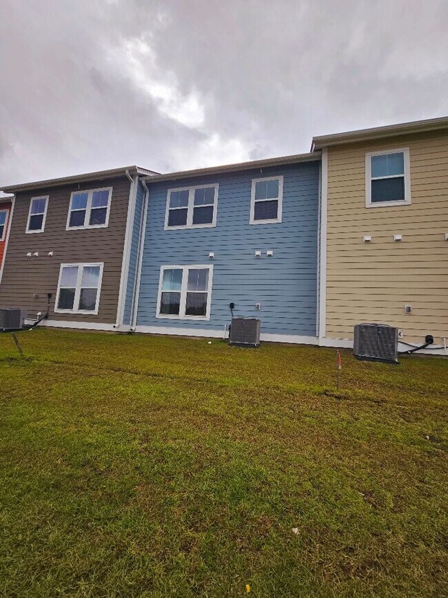 Building Photo - Belle Harbour @ Market Common