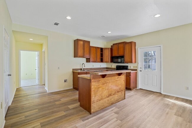 Building Photo - White picket fence cottage, ready to be your next home!