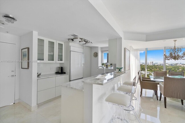 Building Photo - 10275 Collins Ave