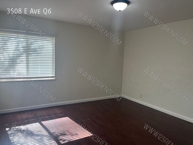 Building Photo - 3508 E Ave Q6