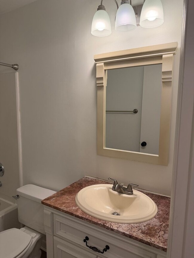 Building Photo - Updated First Floor Forest Cove Condo- Bike to the Beach!