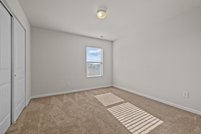 Building Photo - Spacious 5 Bedroom Home with 2-Car Garage,...