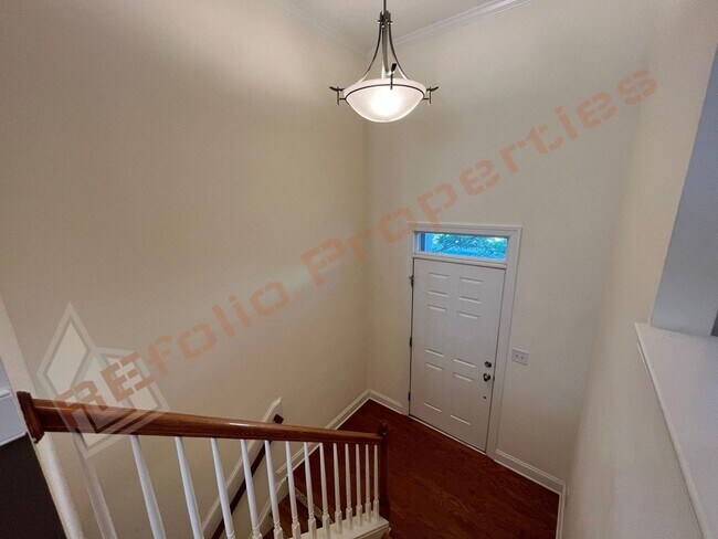 Building Photo - Elegant 3 Story 3 Bedroom Formal Model Tow...