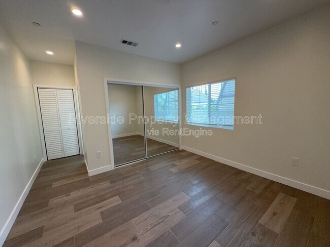 Building Photo - 7893 Mango Ave