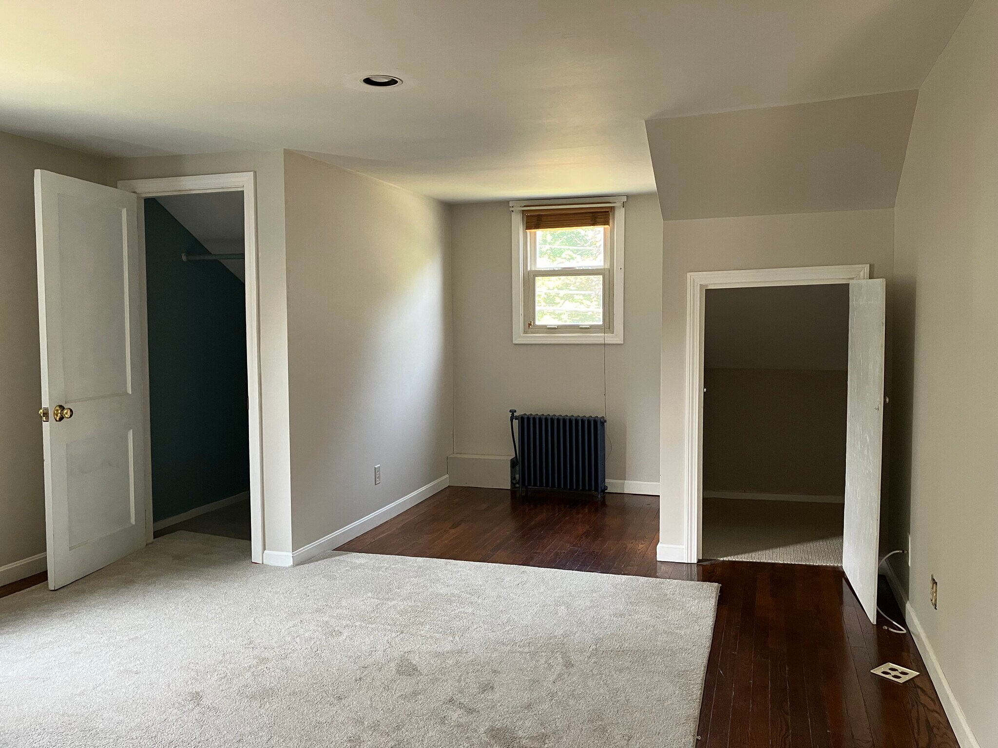 View of same bedroom with closet and storage space in the other direction - 126 Clover Hill St