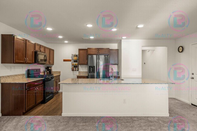 Building Photo - Spacious 4-Bedroom Lemon Valley Home with ...