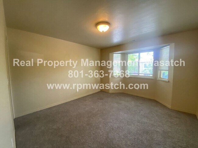 Building Photo - Come See This Great 2 Bedroom 1 Bath Condo In Salt Lake City!