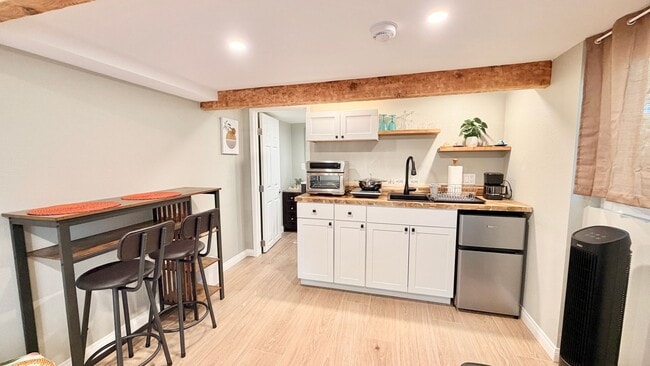 Building Photo - Darling Open Studio Layout Guest Home unit on Lush and Beautifully Landscaped Private Property in...