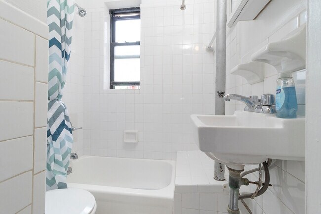 Building Photo - 306-318-318 E 96th St