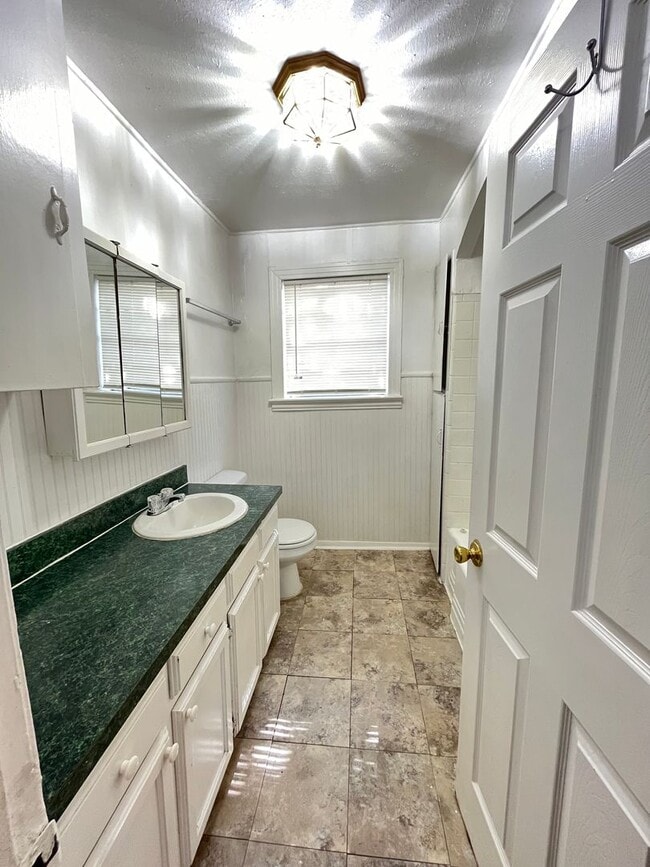 Building Photo - Denton Charmer with Big Yard, Carport & Flexible Living Space